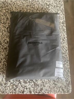 Essentials Black Packaged Hoodie with Minimal Logo